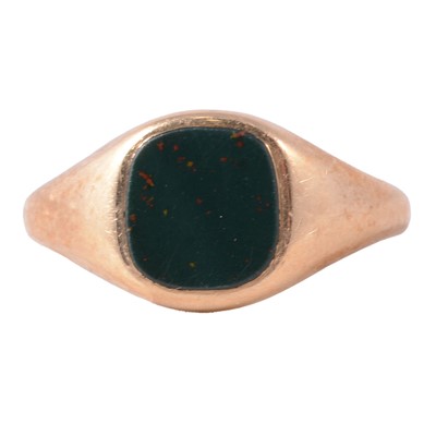 Lot 102 - A 9 carat yellow gold bloodstone signet ring by Charles Green & Sons.