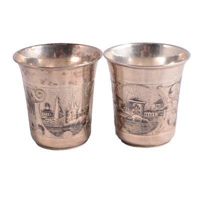 Lot 190 - Two 19th century Russian white metal and niello beakers.