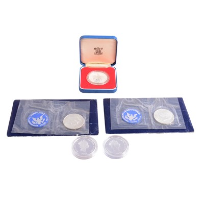 Lot 152 - Five silver coins, UK, Solomon Islands, and USA.