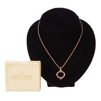 Lot 361 - Bent Gabrielsen Pedersen for Georg Jensen - a 14 carat yellow gold pendant number 608.