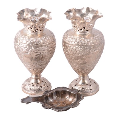 Lot 168 - Pair of Indian white metal vases and a silver tea strainer