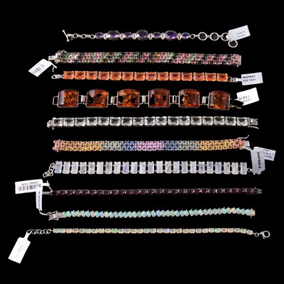 Lot 399 - Twenty-one gemset silver and white metal bracelets, new and unworn.