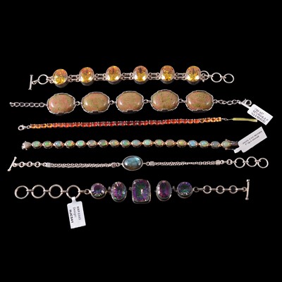 Lot 397 - Twenty-one gemset silver and white metal bracelets, new and unworn.