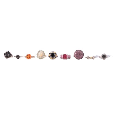 Lot 392 - Twenty-eight gemset silver and white metal rings, new and unworn.
