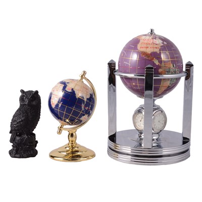 Lot 147 - Two small gemstone globes, and a carved shungite owl.