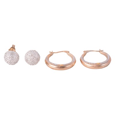 Lot 258 - A pair of diamond earstuds, and a pair of yellow and white metal earhoops.