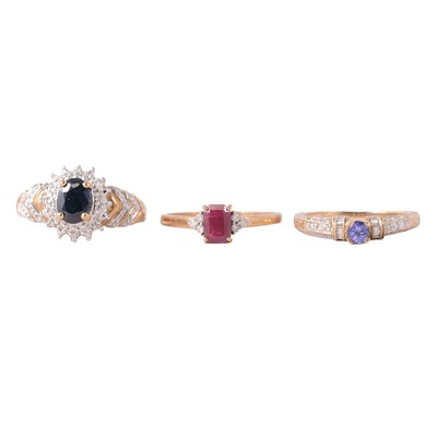 Lot 98 - Three gemset 9 carat gold rings.
