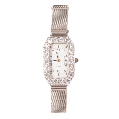 Lot 336 - A 1930s lady's diamond set bracelet wristwatch with replacement dial and modern movement.