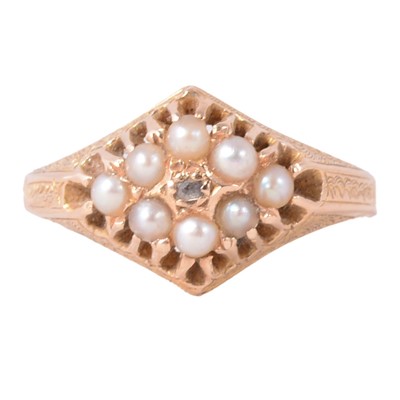 Lot 46 - A diamond and seed pearl ring.