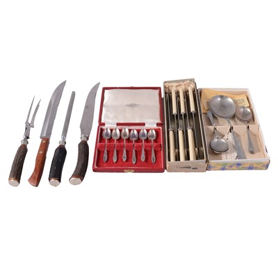 Lot 82 - A large box of loose cutlery, including, horn handled carving set.
