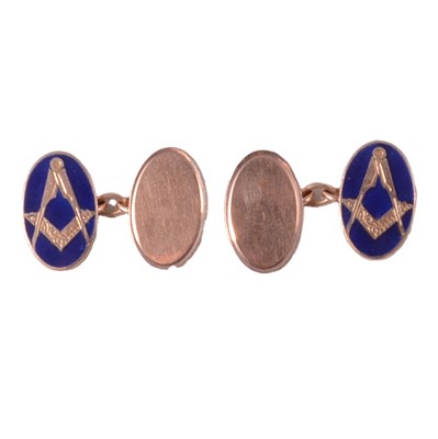 Lot 299 - A pair of 9 carat yellow gold and blue enamel Masonic cufflinks.