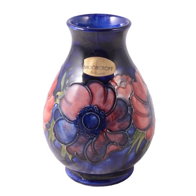 Lot 13 - Moorcroft Pottery - an Anemone pattern baluster vase.