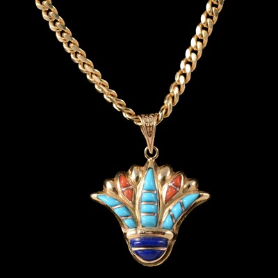 Lot 196 - An Egyptian Lotus flower style multi stone pendant and curb link chain.