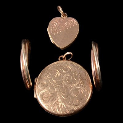 Lot 283 - A pair of 9 carat gold hoop earrings and two lockets.