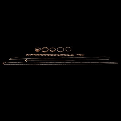 Lot 284 - Five 9 carat yellow gold rings, a 9 carat gold bracelet, and two unmarked chain necklaces.