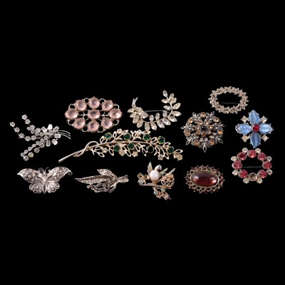 Lot 414 - Forty costume jewellery brooches, some set with clear and / or colourful paste.
