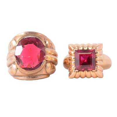 Lot 103 - Two rings set with synthetic red stones.