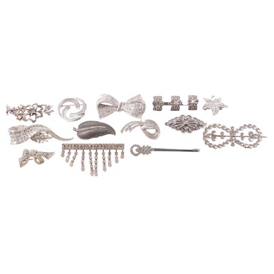 Lot 410 - Thirty-two marcasite and paste set brooches.