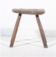 Lot 605 - Old elm milking stool, rectangular plank top...