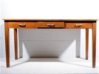 Lot 614 - Factory desk/ work table, three frieze drawers...