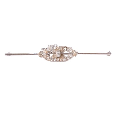 Lot 138 - A diamond bar brooch.