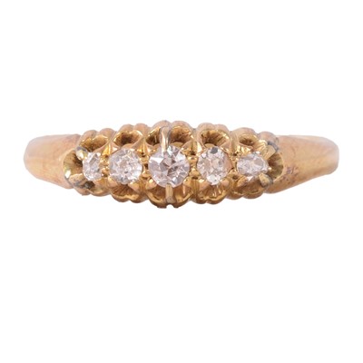 Lot 69 - A diamond five stone ring.