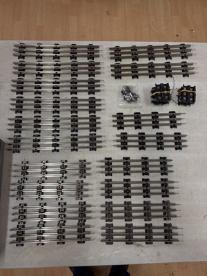 Lot 48 - Shoebox of Merkur 3-rail O-gauge track, and three boxes of Maldon Rail Centre track