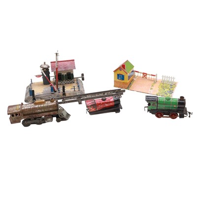 Lot 65 - Hornby and similar, a quantity of O-gauge tinplate trackside buildings and accessories
