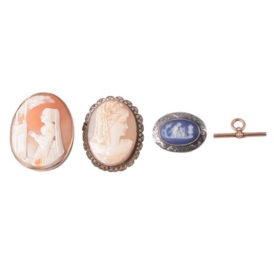 Lot 155 - Two carved shell cameo brooches, a yellow metal T bar, and a Wedgwood jasperware brooch.