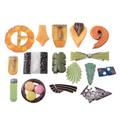 Lot 423 - Twenty bakelite, lucite and plastic Art Deco style clips, brooches and buckles.
