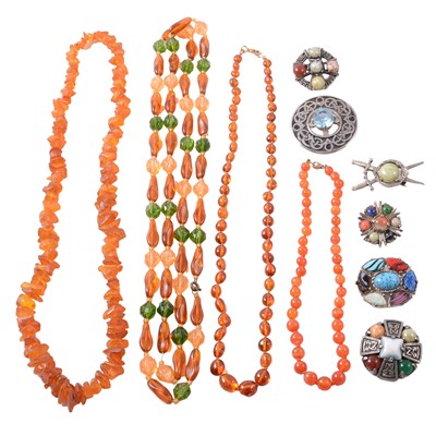 Lot 467 - Amber and cornelion necklaces, Scottish brooches, paste earrings.