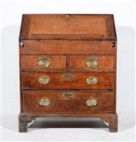 Lot 630 - George II oak bureau, of small proportions,...