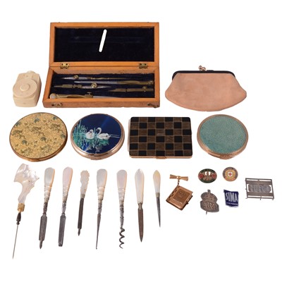 Lot 473 - Four powder compacts, drawing set, medals, badges, commemorative souvenirs, and manicure items.
