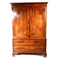 Lot 638 - George III mahogany linen press, cavetto...
