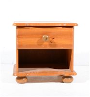 Lot 645 - Small pine bedside cupboard, with single...