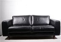 Lot 647 - Two-seater modern black leather sofa, width...