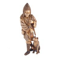 Lot 92 - A Japanese carved and stained ivory okimono, a...