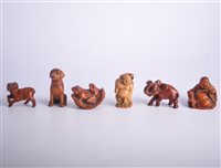 Lot 43 - Japanese carved hardwood netsuke modelled as...