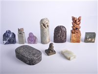 Lot 50 - Three carved soap stone seals; a Lapis...