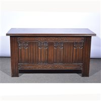 Lot 537 - Modern oak coffer, carved and fold panel front,...