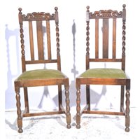 Lot 492 - Set of four oak dining chairs, 1940s, carved...