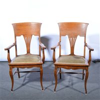 Lot 494 - Pair of American oak elbow chairs, pierced...
