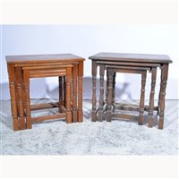 Lot 496 - Nest of three oak occasional tables, turned...