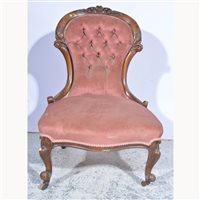 Lot 504 - Victorian walnut nursing chair, carved...