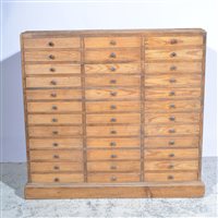 Lot 465 - Pine chest, fitted with three banks of twelve...