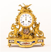 Lot 56 - Louis XV style gilt metal and Serves style...