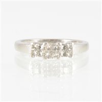 Lot 204 - A Princess cut diamond ring, the twelve...