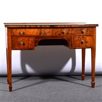Lot 366 - Mahogany dressing table, bowfront, the kneehole surrounded by four drawers