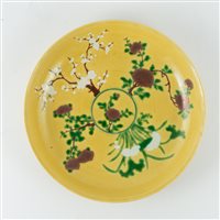 Lot 25 - Chinese yellow ground circular dish, bearing...