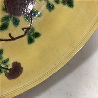Lot 25 - Chinese yellow ground circular dish, bearing...